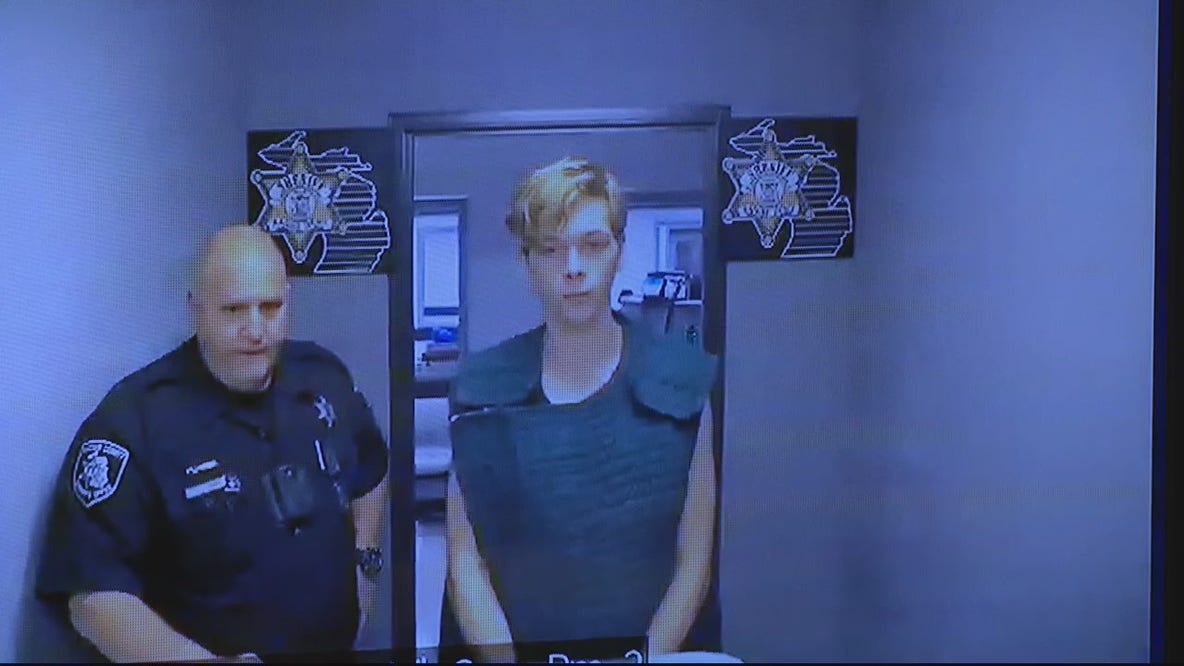 Man charged for concealing death of woman found in flatbed of truck he was driving